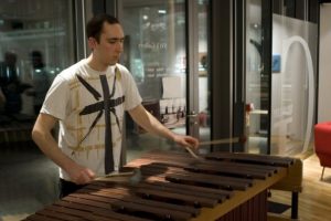 Rev'd Gerard Rundell playing a xylophone