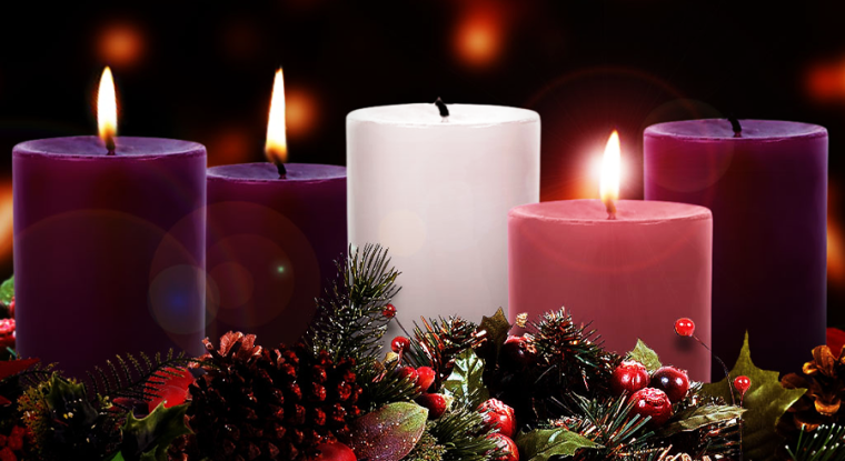 A photograph of three purple candles, one white candle, and a pink candle. Two purple candles and a pink candle are lit.