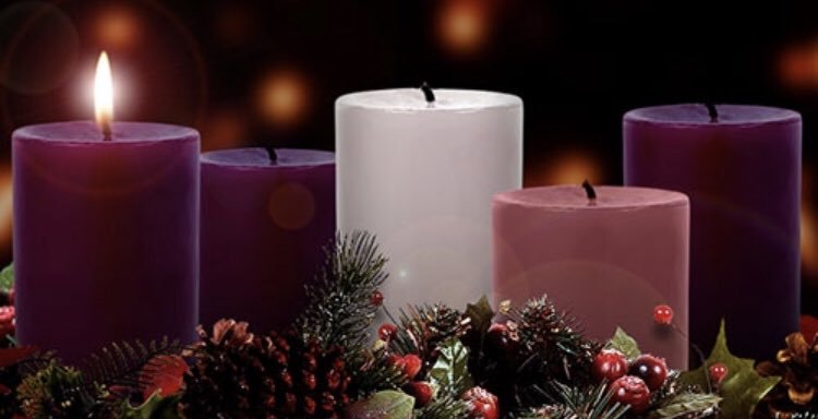 A photograph of three purple candles, one pink candle, and a white candle. The first purple candle is lit.
